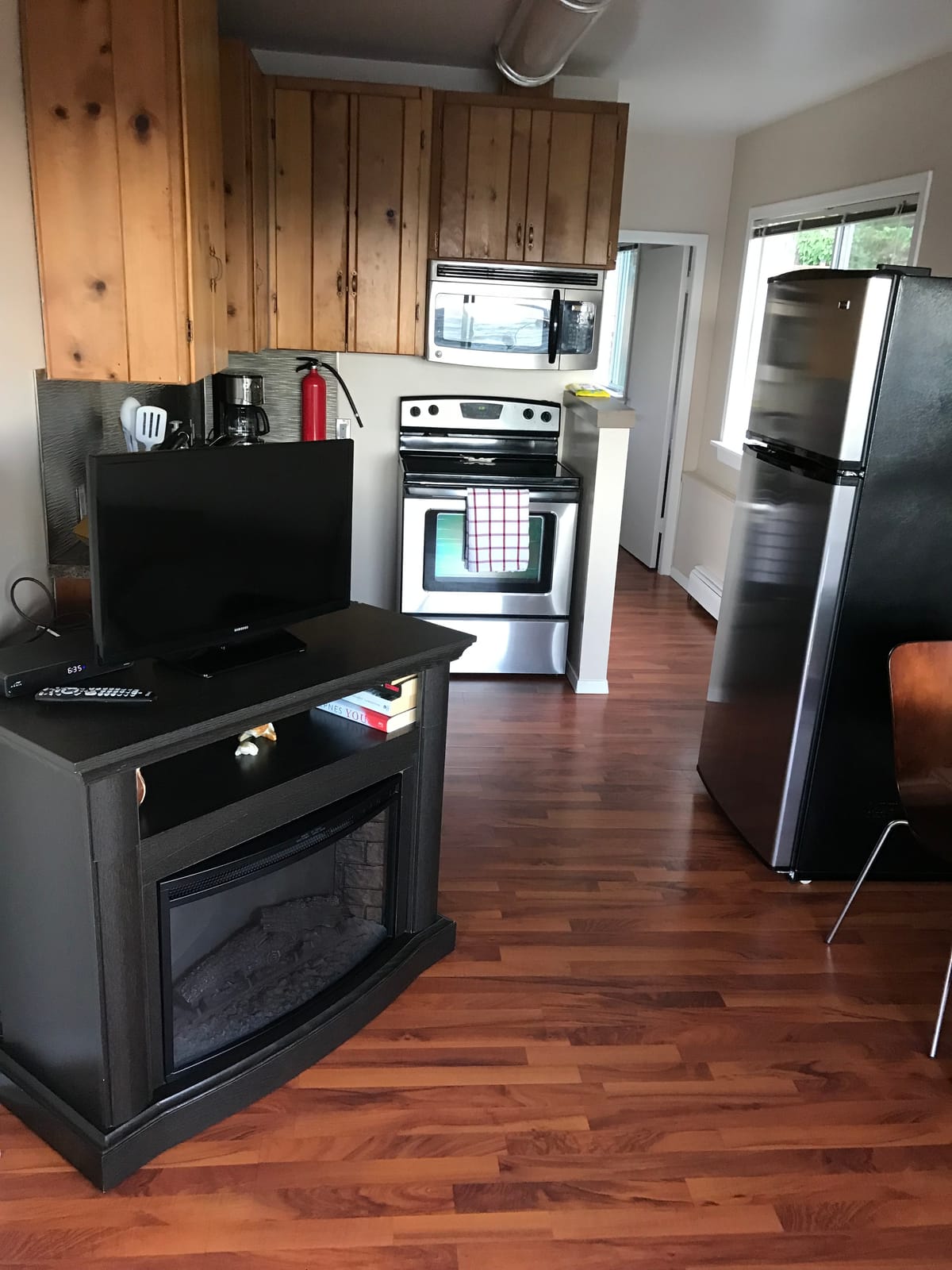 Full kitchen with knotty pine cabinets